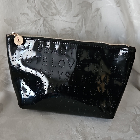 Yves Saint Laurent Handbags - Yves Saint Laurent Cosmetics Bag.